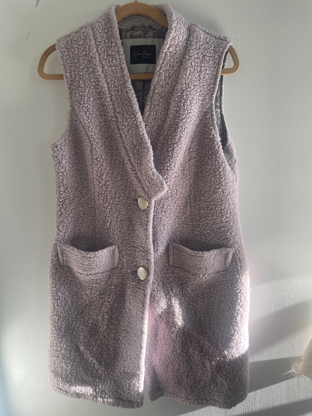 This is a lavender Jessica Simpson faux shearling teddy jacket.
